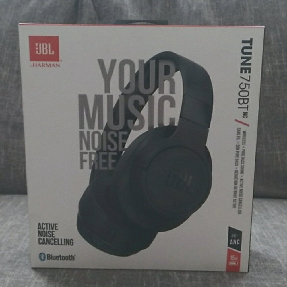 Headphones, black, 15Hrs of music, come with charger, brand new.